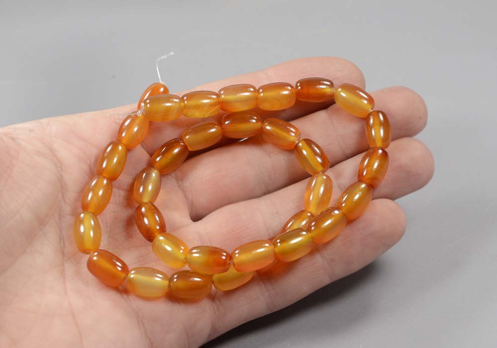 Сердолик бусины бочонки 12-8 мм - купить