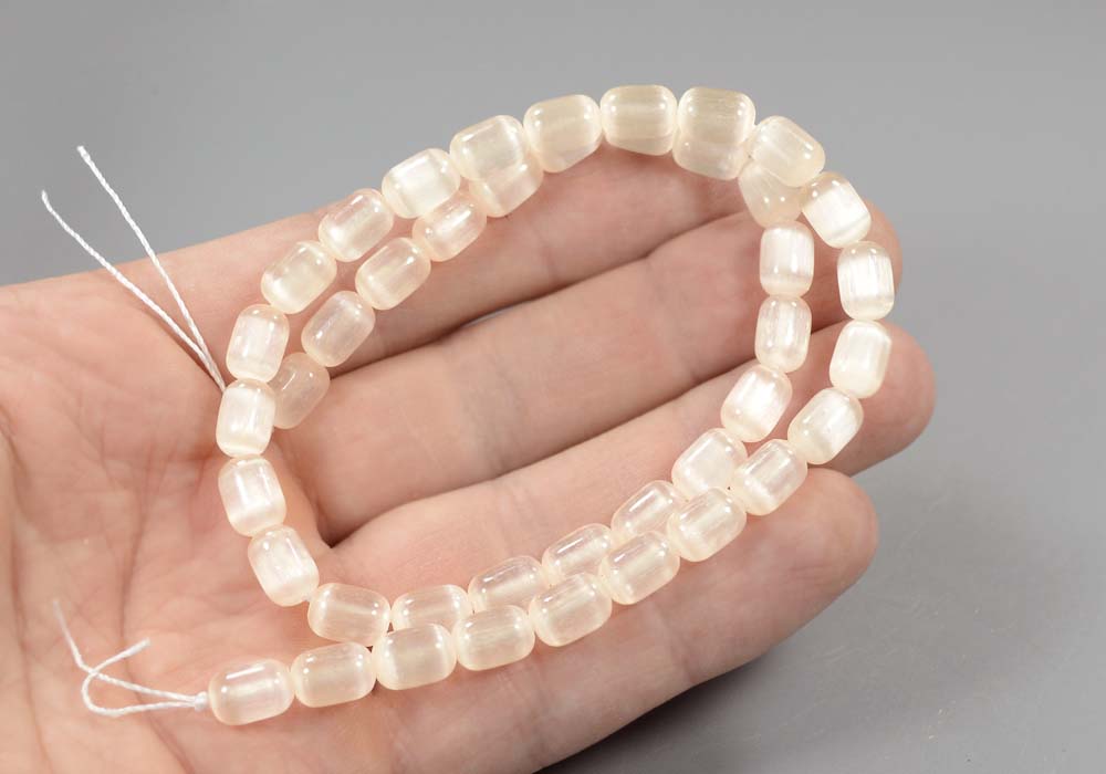 Бусины из селенита, бочонок бежевый 9-6,5 мм - вид сбоку