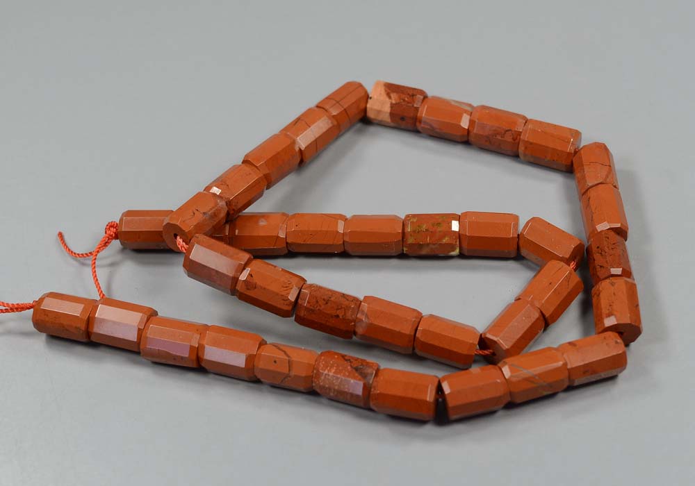 Бусины из красной яшмы, бочонок с огранкой 10-7 мм - фото товара